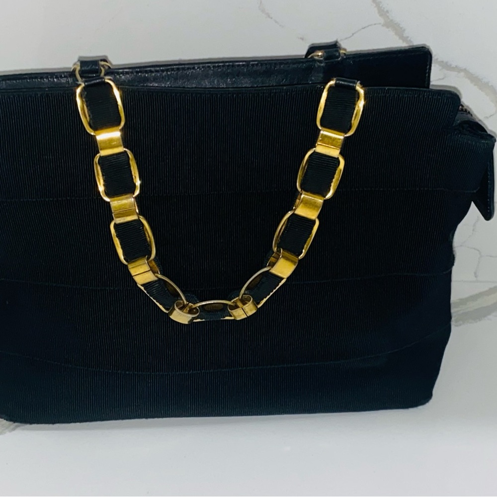 Salvatore Ferragamo Black Bag with Gold Accents‎